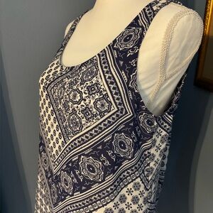 HeartSoul Blue & White sheer flowing blouse has a hi- lo hem w/cute back cut out